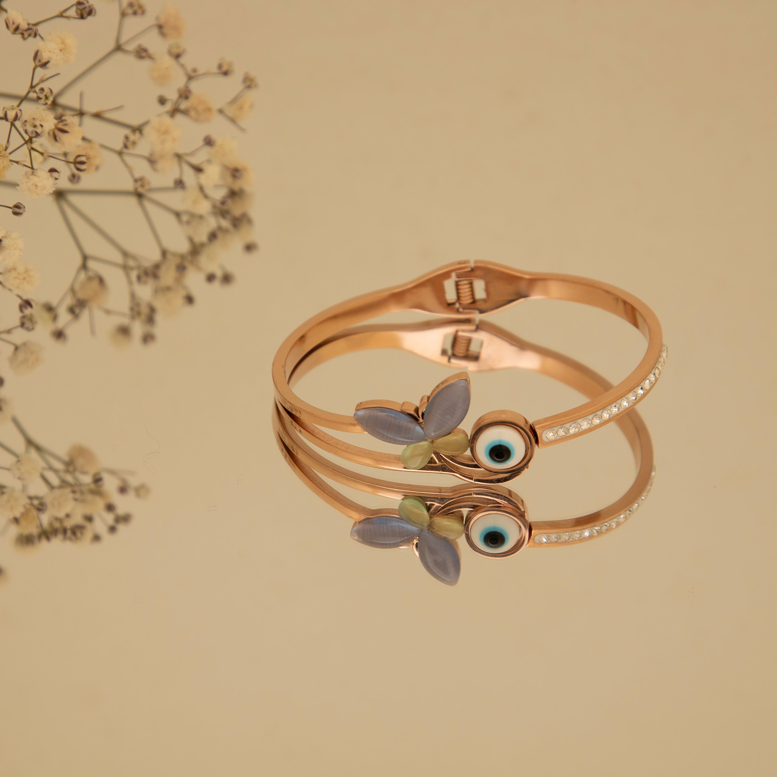 LA FILLE D'OR Evil Eye Butterfly Bracelet, Rose Gold Toned Crystal Bangle, Hinged Design