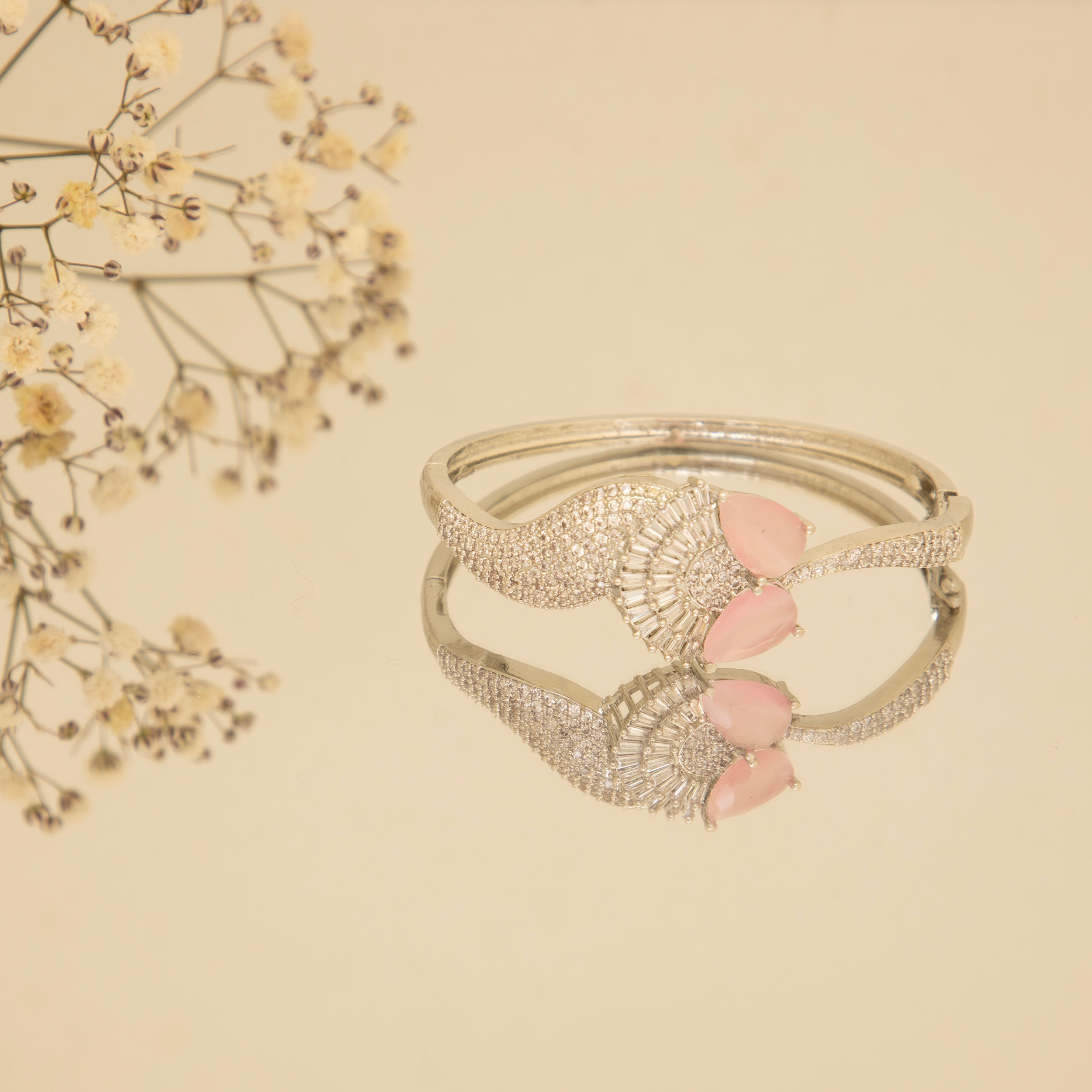 LA FILLE D'OR Bangle style Bracelet with Pink stones and American Diamonds.