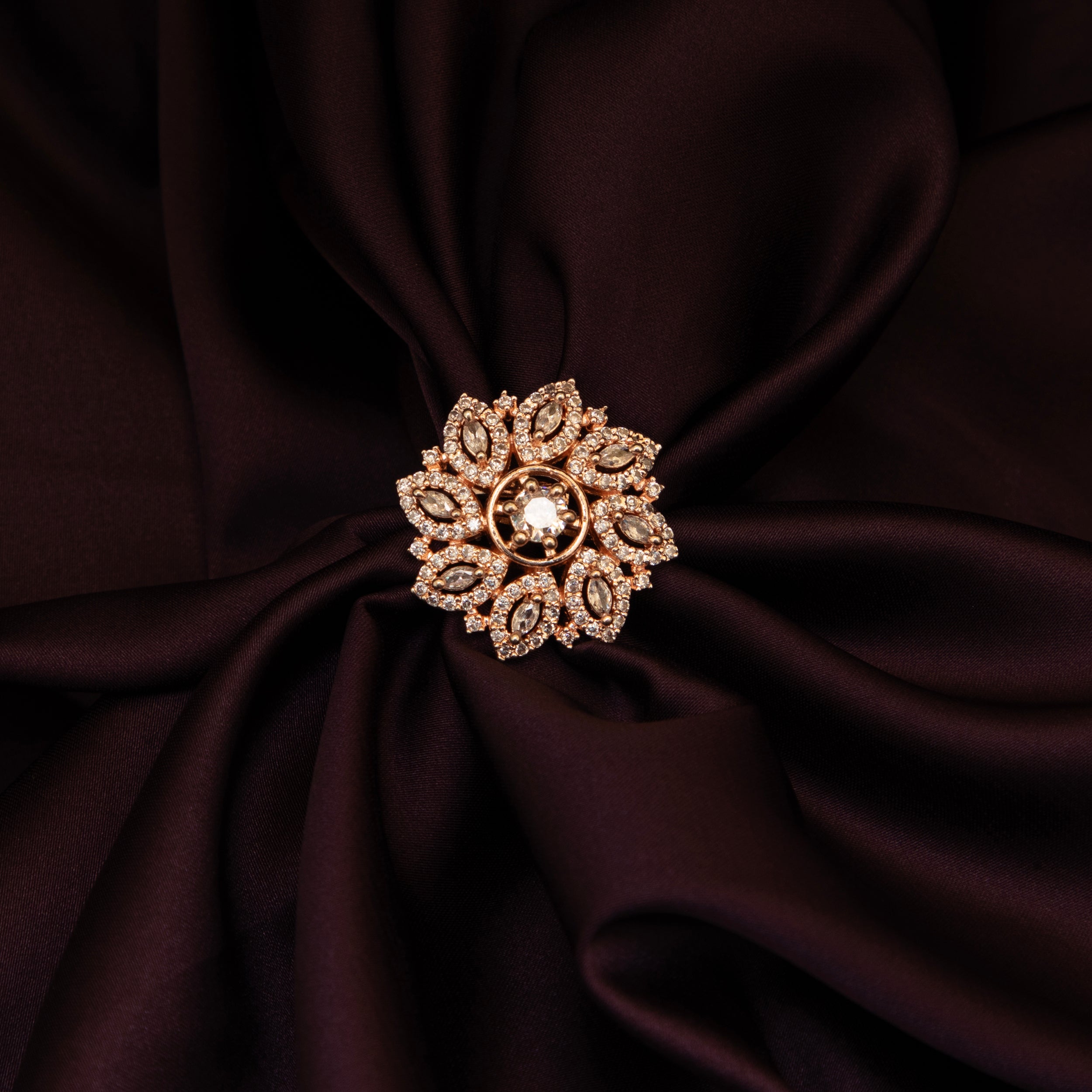 LA FILLE D'OR Rose Gold Plated Cubic Zirconia Floral Ring.