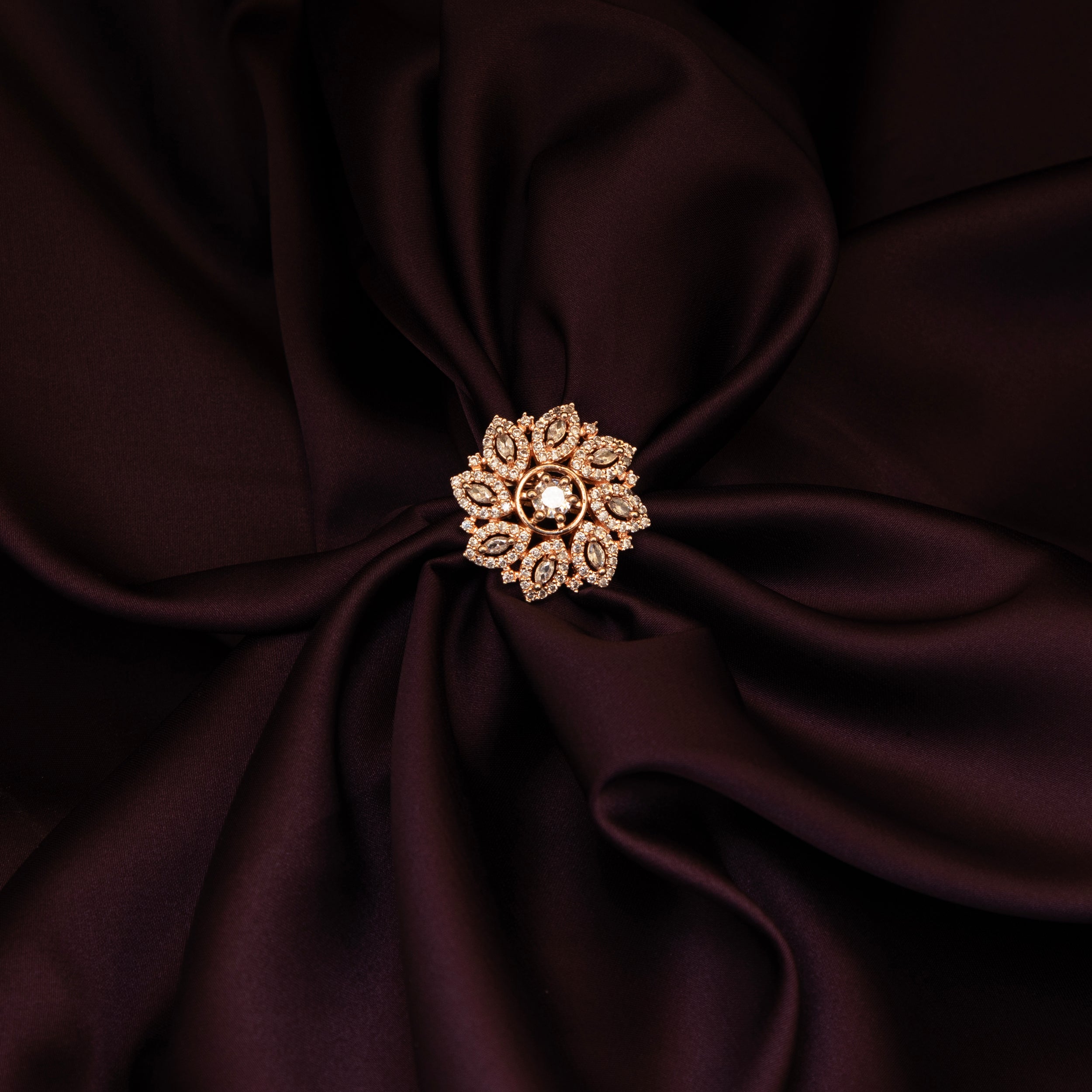 LA FILLE D'OR Rose Gold Plated Cubic Zirconia Floral Ring.