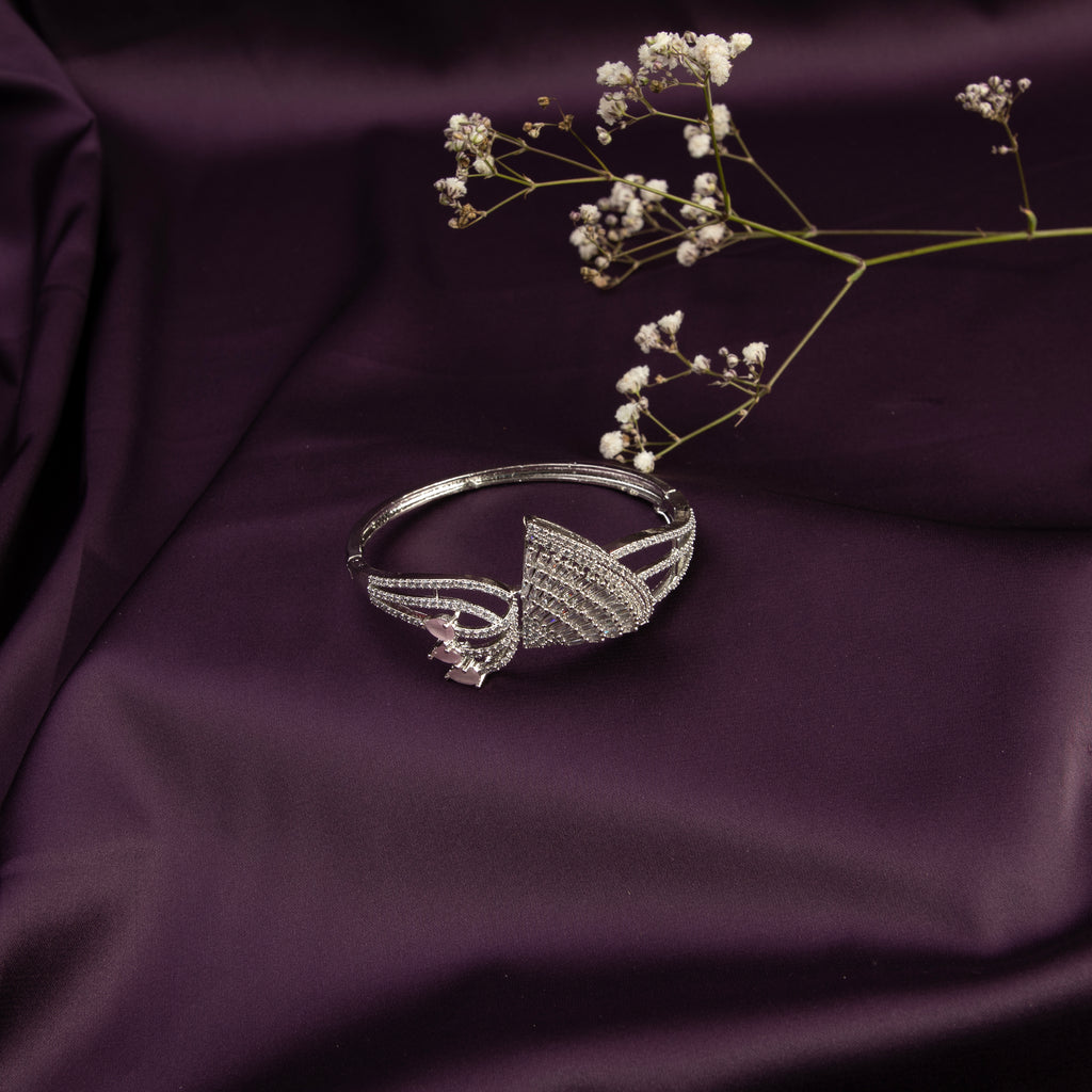 LA FILLE D'OR American Diamond and Pink stone Studded Bangle style bracelet.