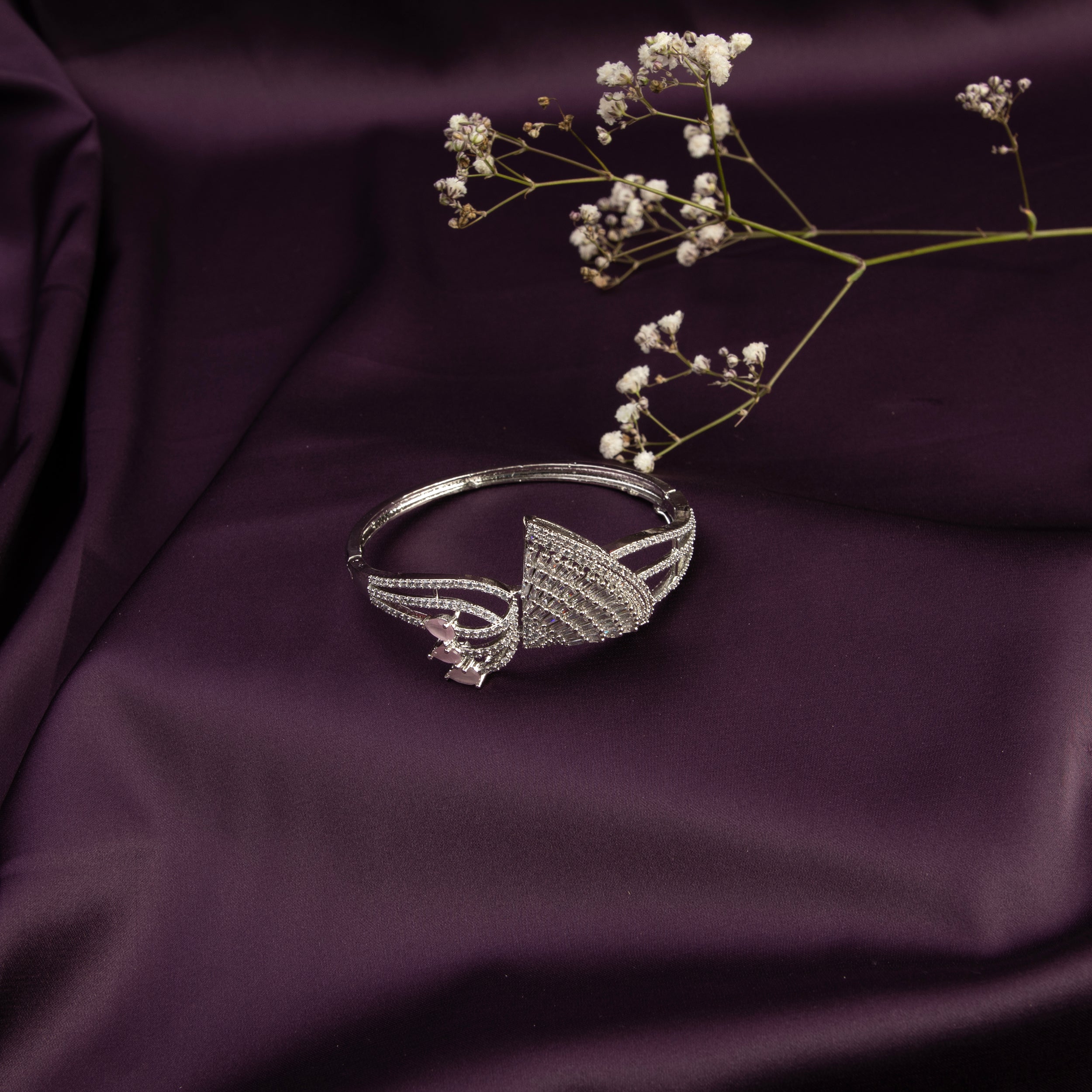 LA FILLE D'OR American Diamond and Pink stone Studded Bangle style bracelet.