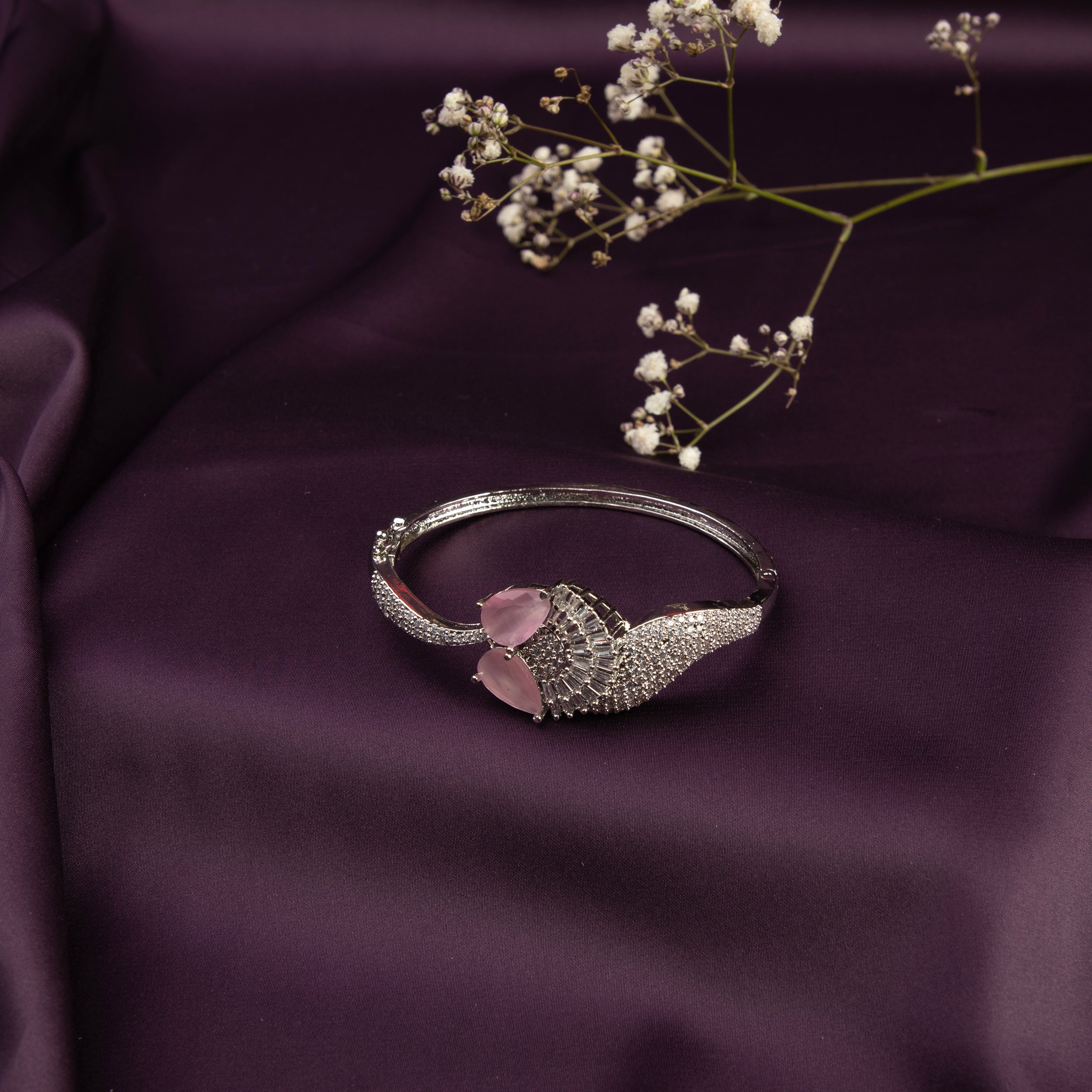 LA FILLE D'OR Bangle style Bracelet with Pink stones and American Diamonds.