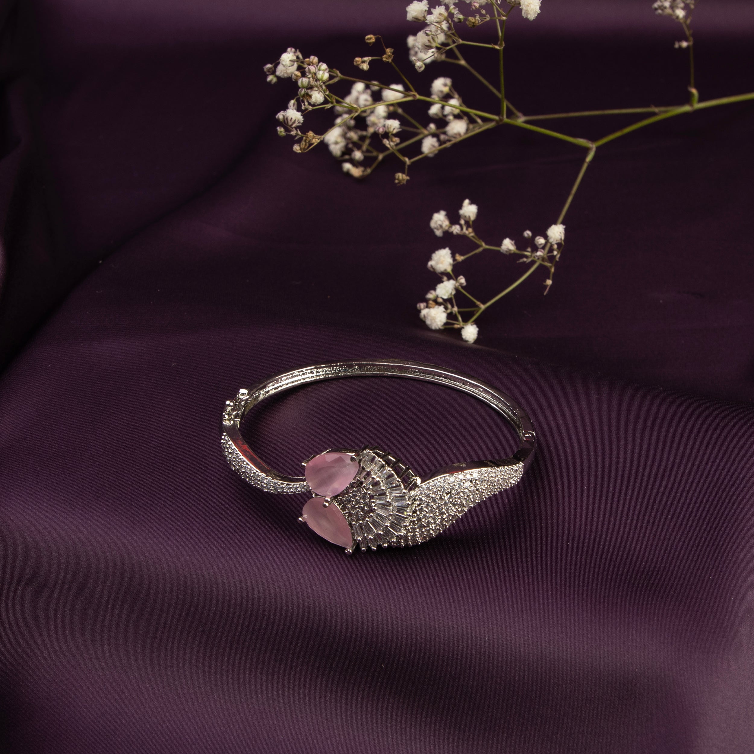 LA FILLE D'OR Bangle style Bracelet with Pink stones and American Diamonds.