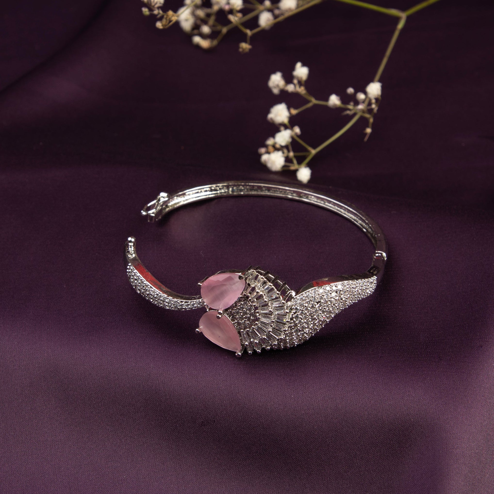 LA FILLE D'OR Bangle style Bracelet with Pink stones and American Diamonds.