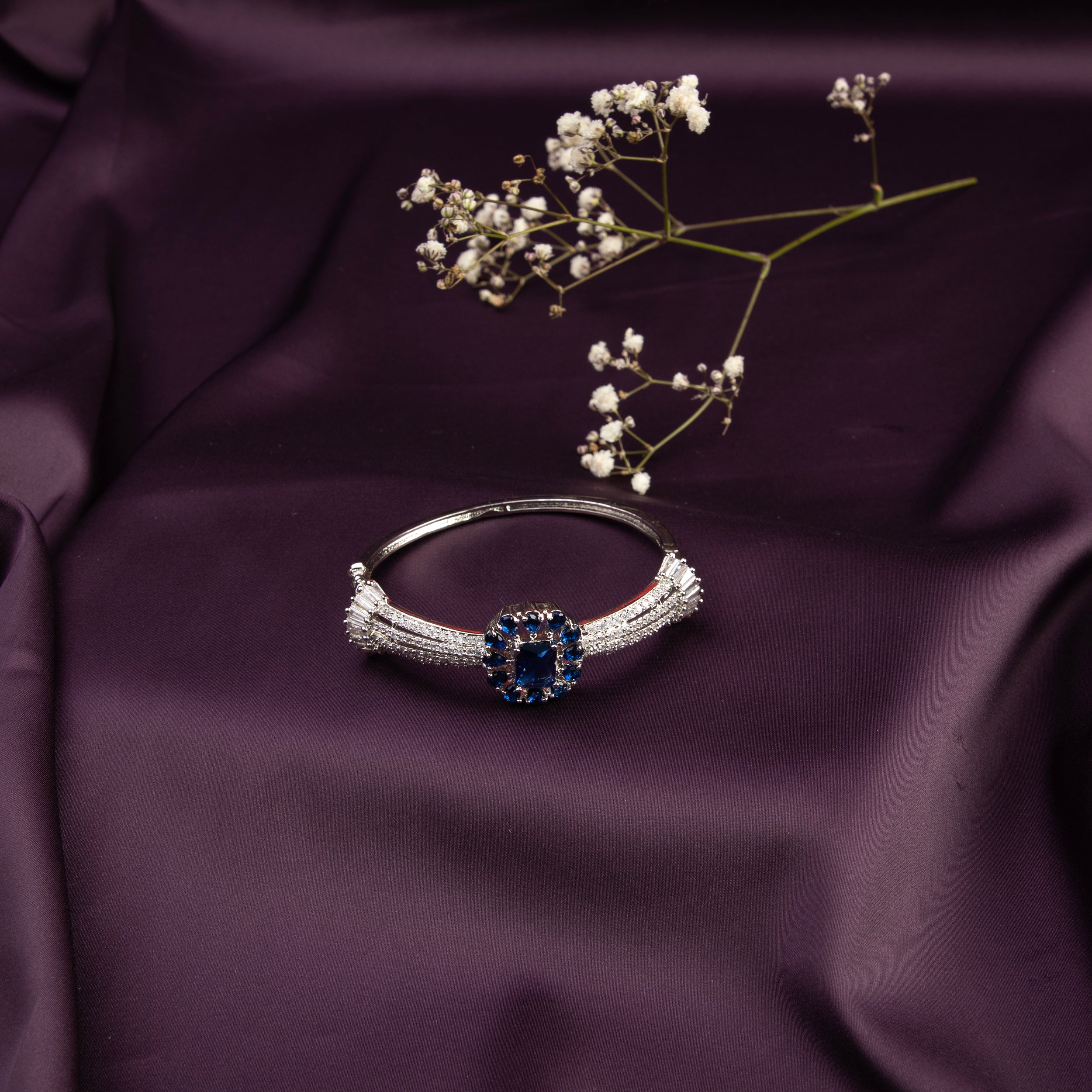 LA FILLE D'OR Silver colour brass Bracelet with Blue Stone, American Diamond Accents.