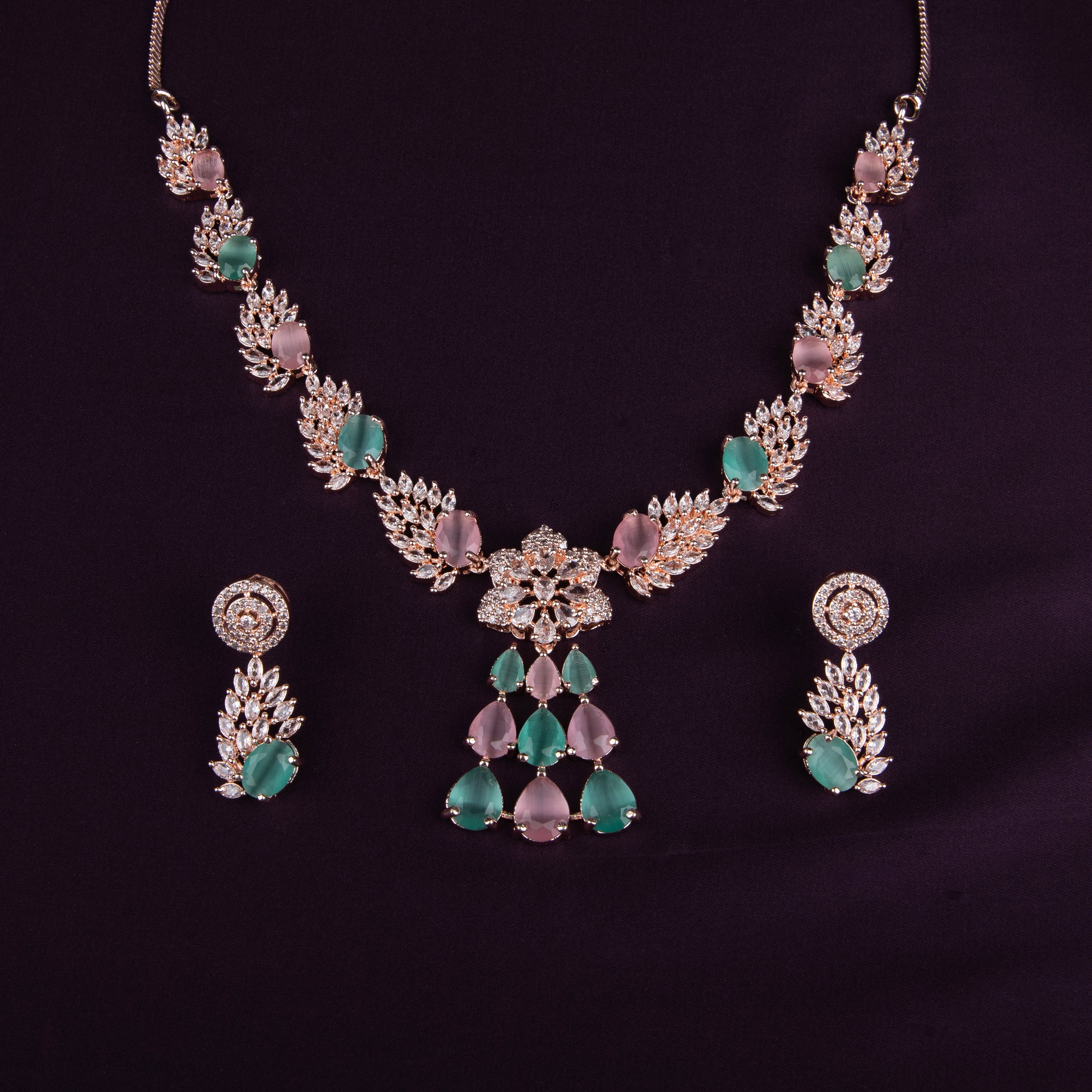 Elegant Rose Gold Necklace Set with Pink and Mint Green stones.
