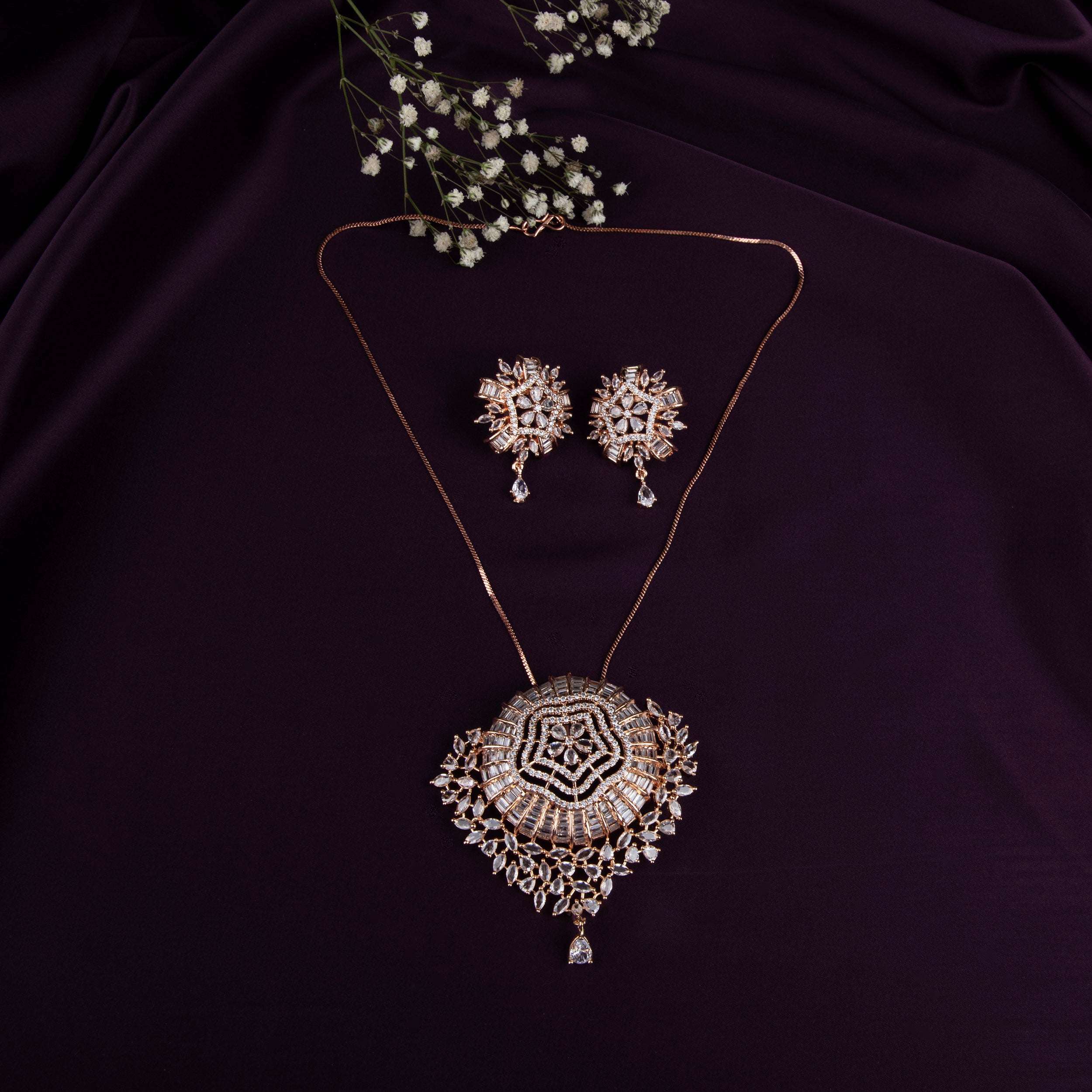 LA FILLE D'OR Rose Gold Plated Necklace Set with Intricate Crystal Embellished Pendant.