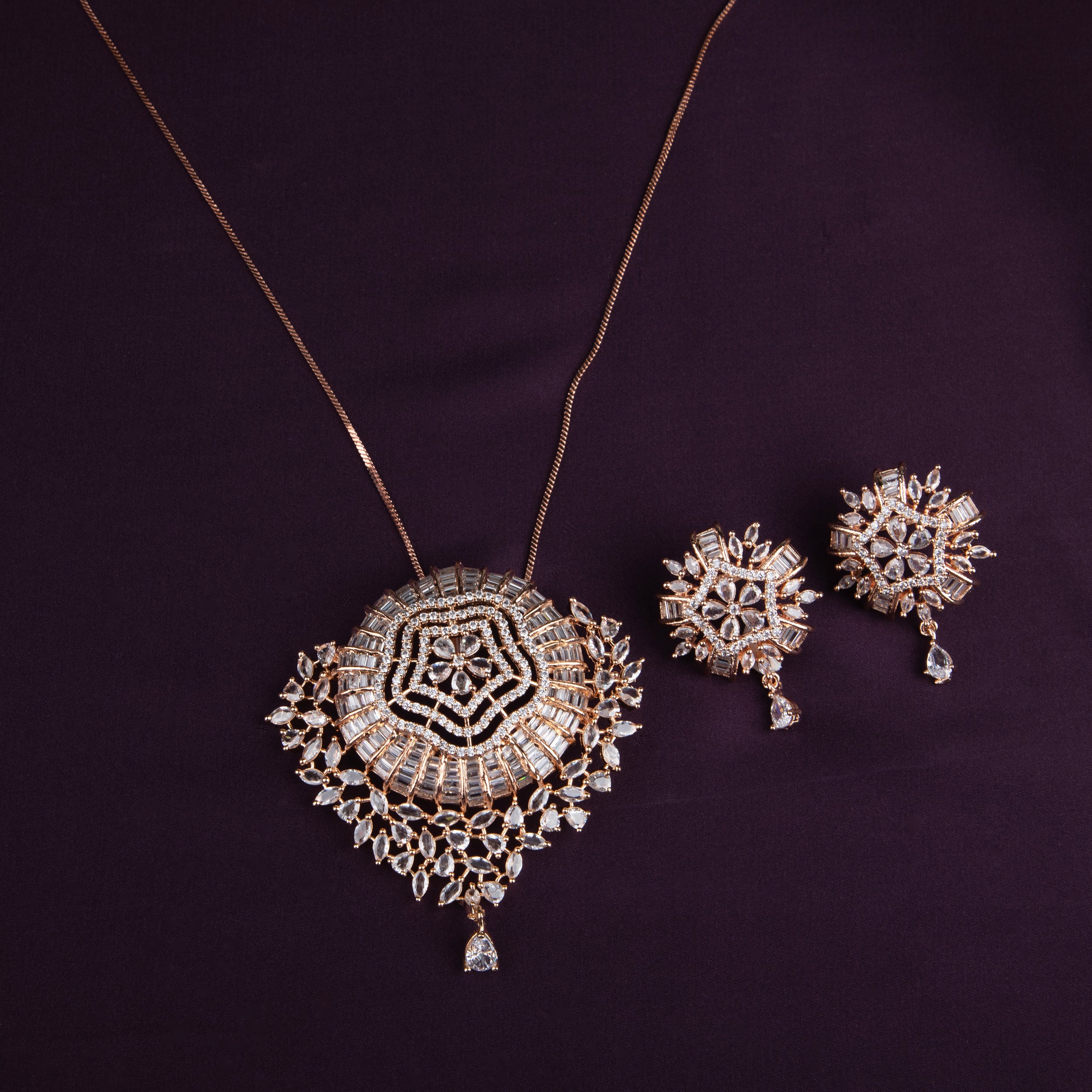 LA FILLE D'OR Rose Gold Plated Necklace Set with Intricate Crystal Embellished Pendant.