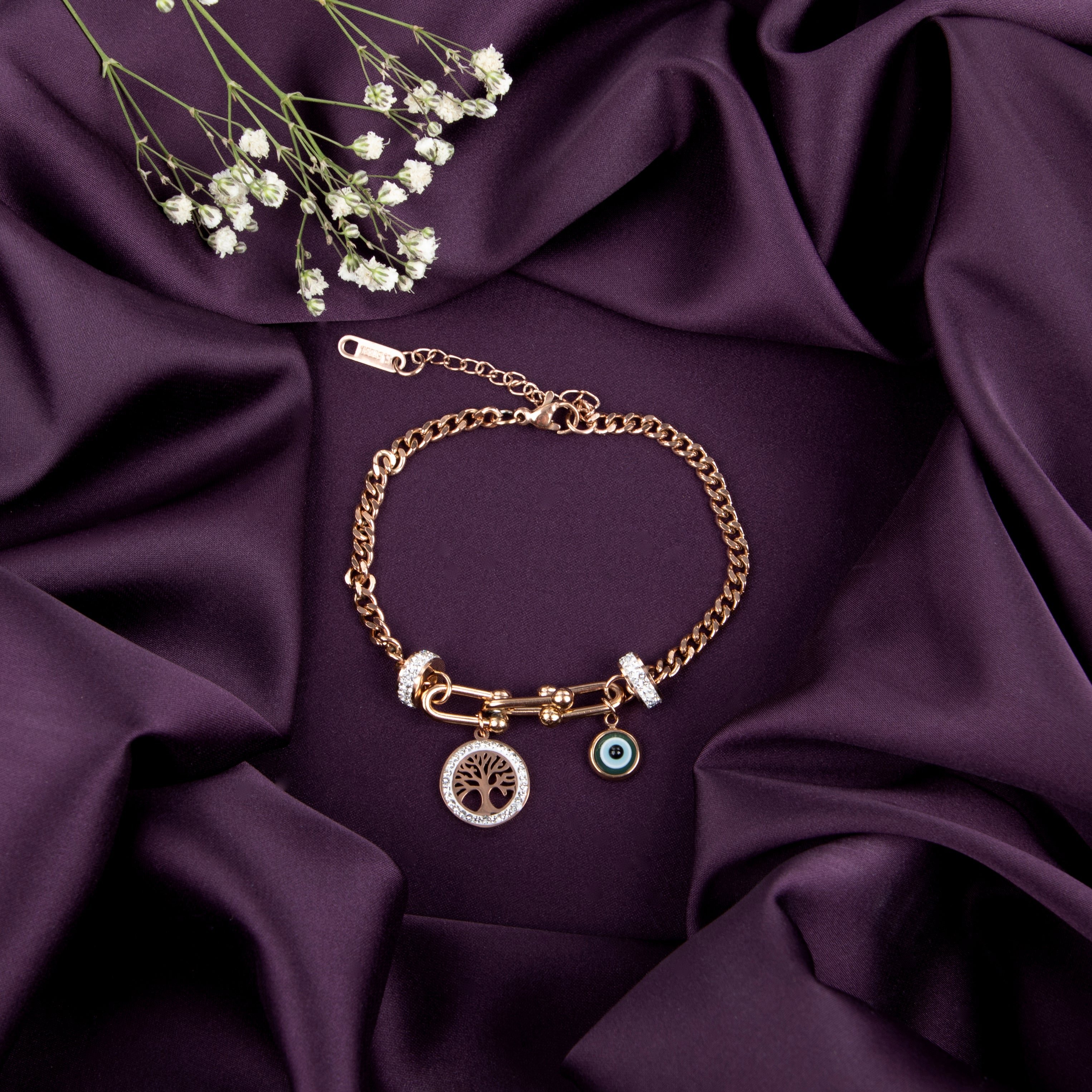 LA FILLE D'OR Double Layer Chain Bracelet with Evil Eye and Crystal Charms, Rose Gold Toned, Blue Sapphire Accents