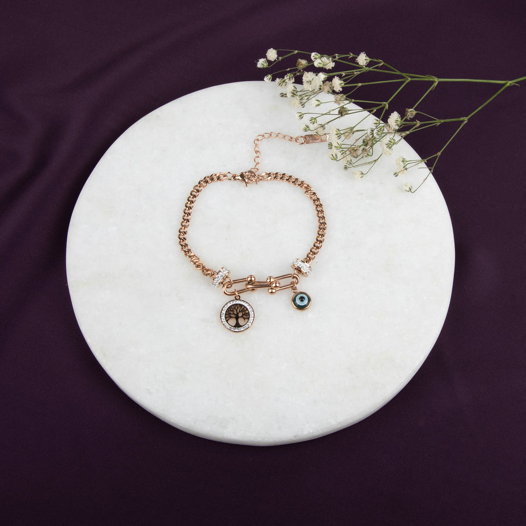 LA FILLE D'OR Double Layer Chain Bracelet with Evil Eye and Crystal Charms, Rose Gold Toned, Blue Sapphire Accents