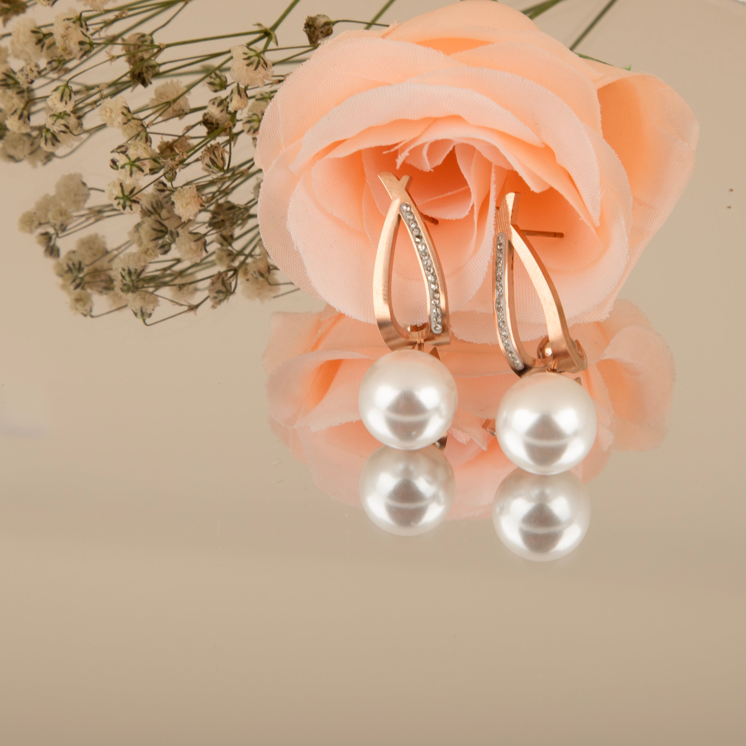 LA FILLE D'OR Rose Gold Earrings with Pearls and Crystals.