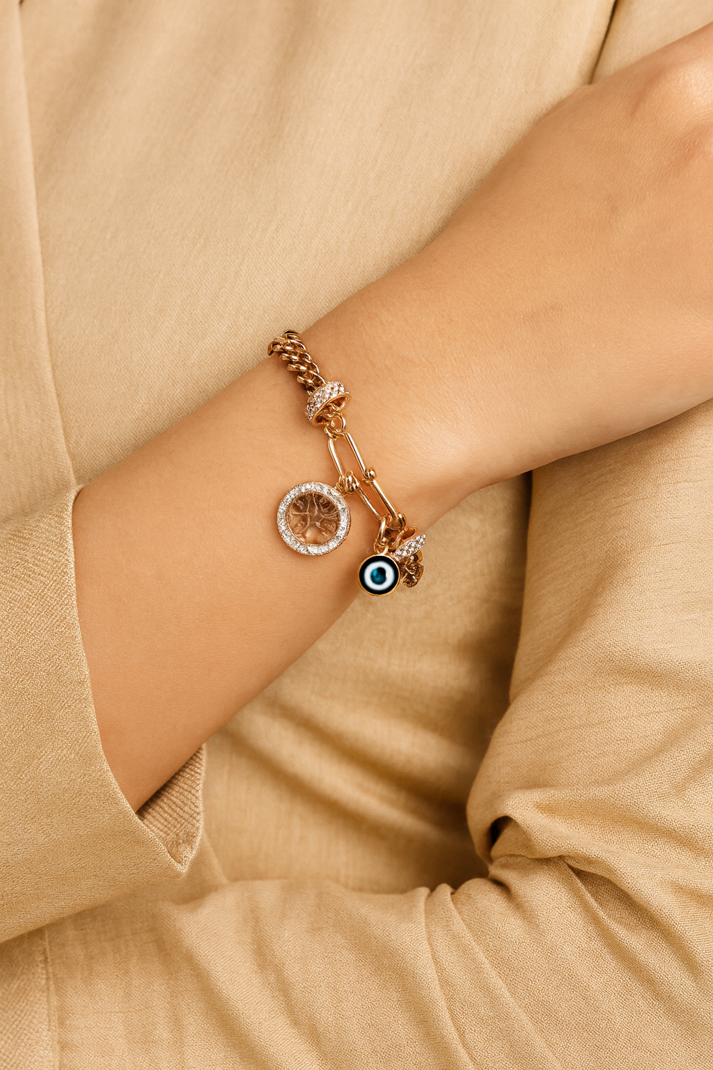 LA FILLE D'OR Double Layer Chain Bracelet with Evil Eye and Crystal Charms, Rose Gold Toned, Blue Sapphire Accents
