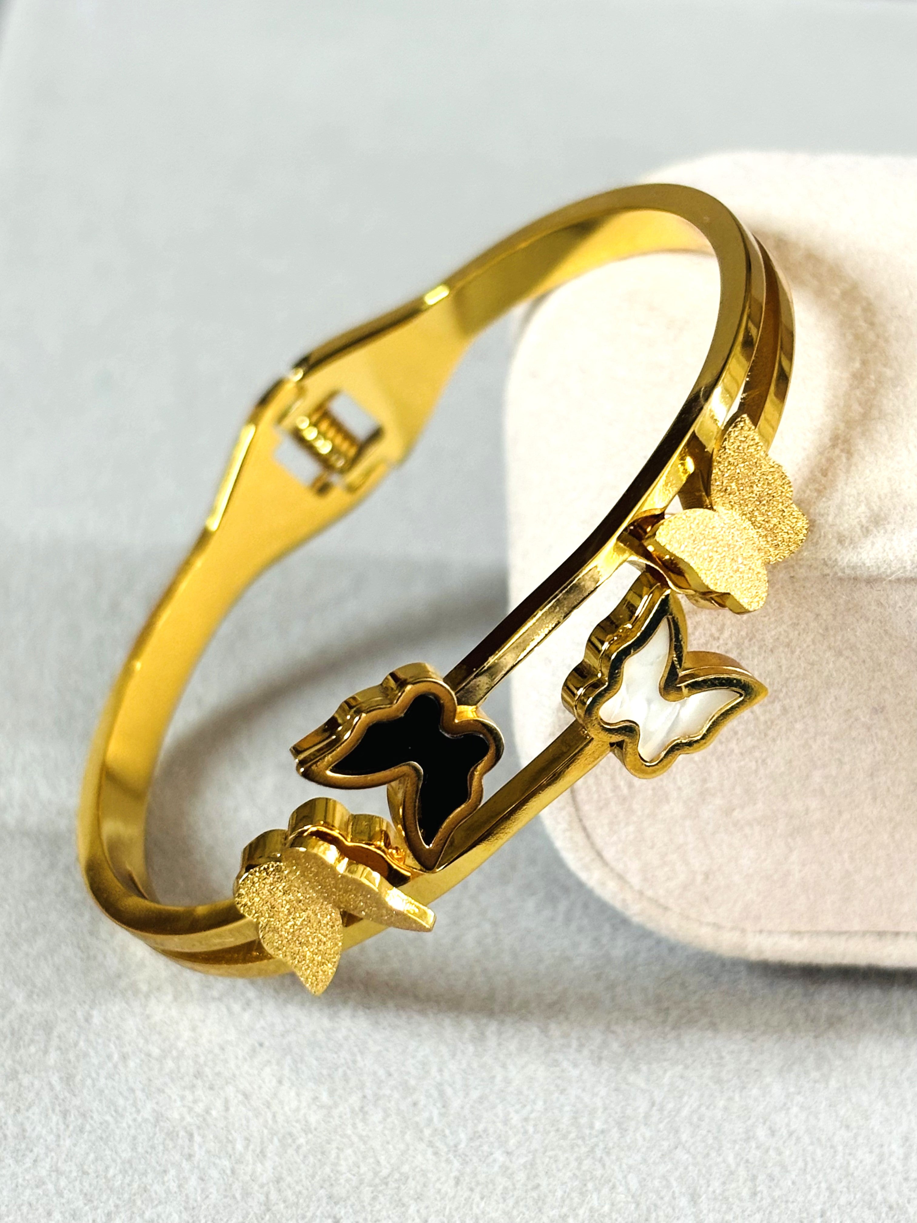 LA FILLE D'OR Gold-Plated Butterfly Bracelet with Black and White Enamel Design