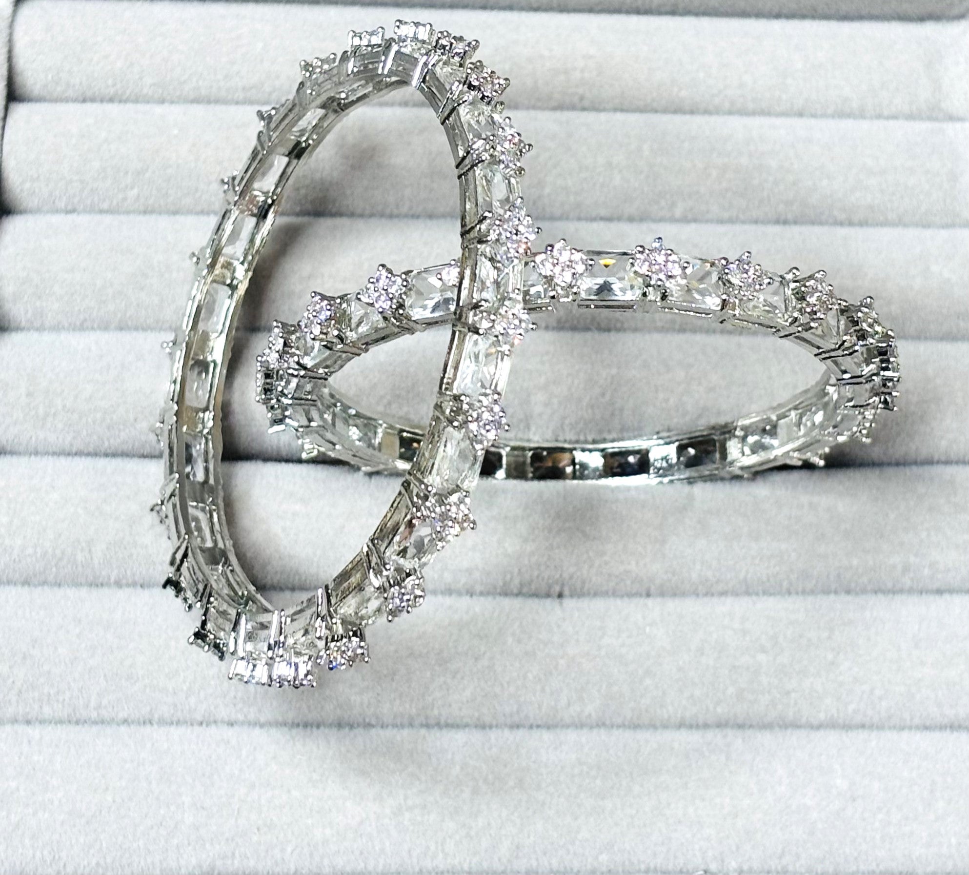 LA FILLE D'OR Luxury Crystal Criss-Cross Bangle, Double Band Design, Silver-Tone with Round Cut Stones. (2.8)