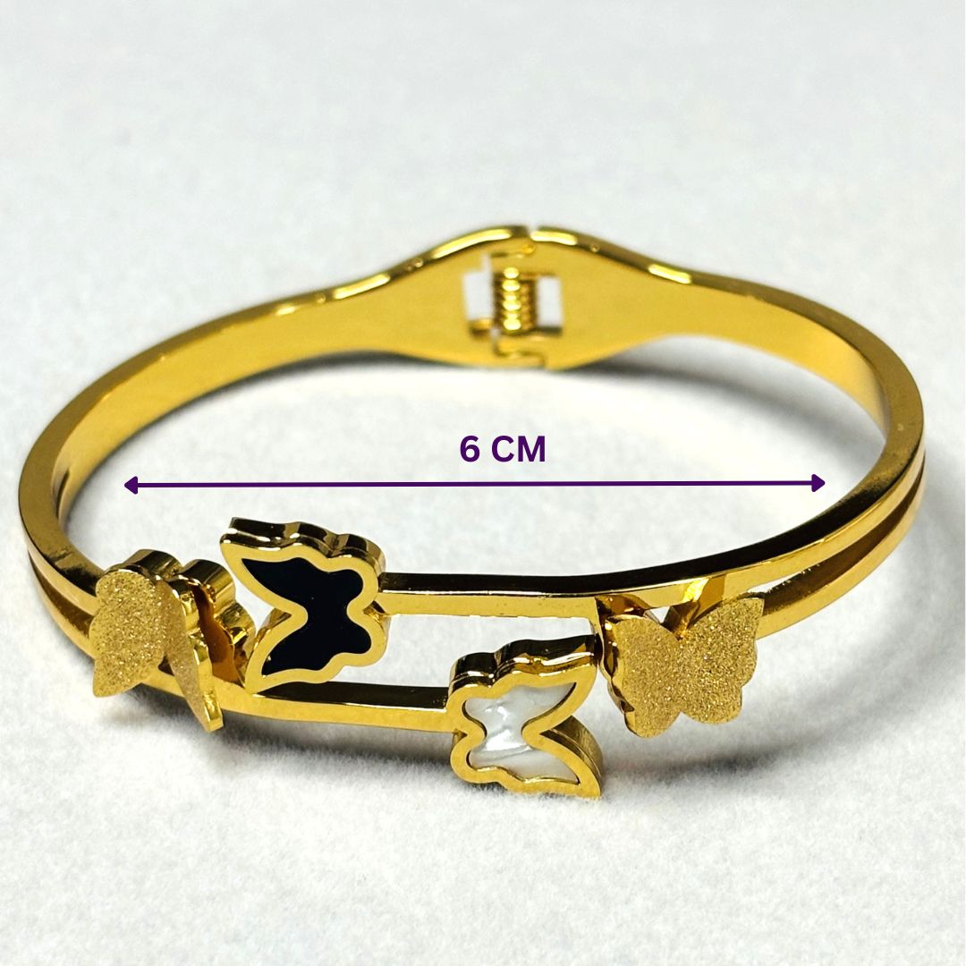 LA FILLE D'OR Gold-Plated Butterfly Bracelet with Black and White Enamel Design